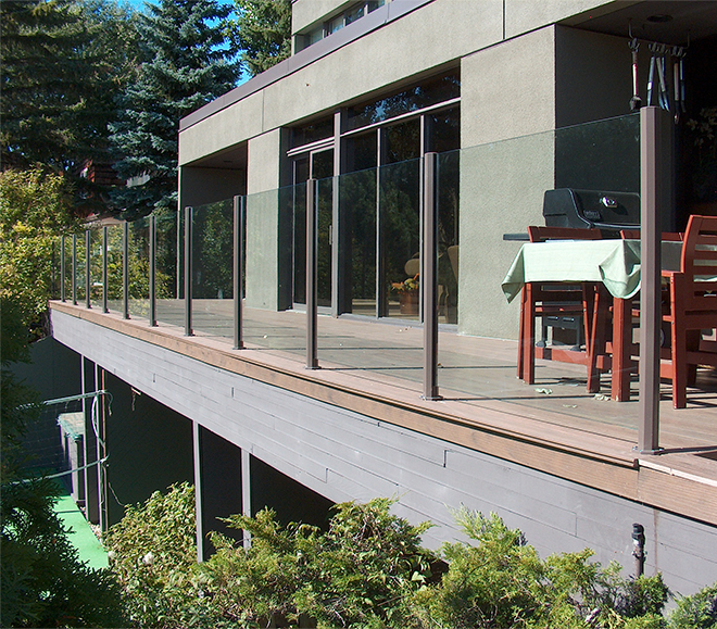 custom deck built with glass railing